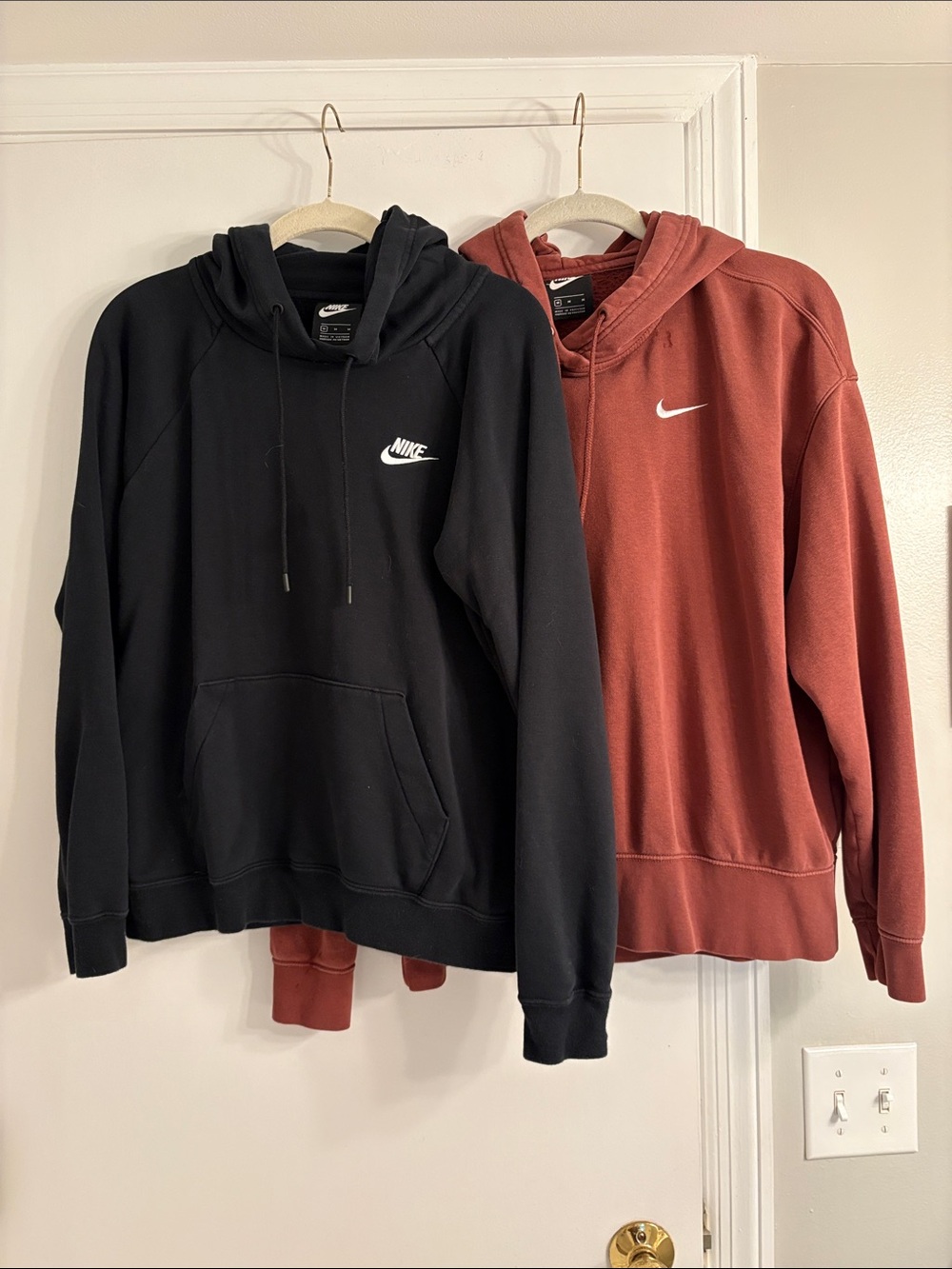 Nike, Set of 2, Women’s Pullover Hoodie size Medium, black and rust